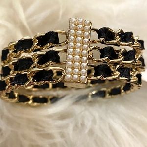 Black and gold bracelet.